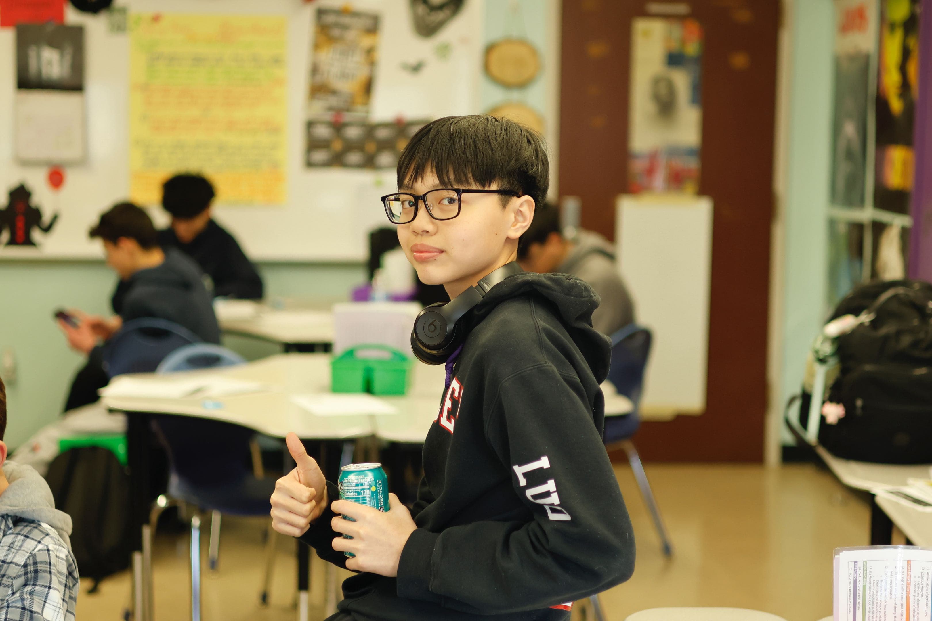 A chemistry club student presenting to the group