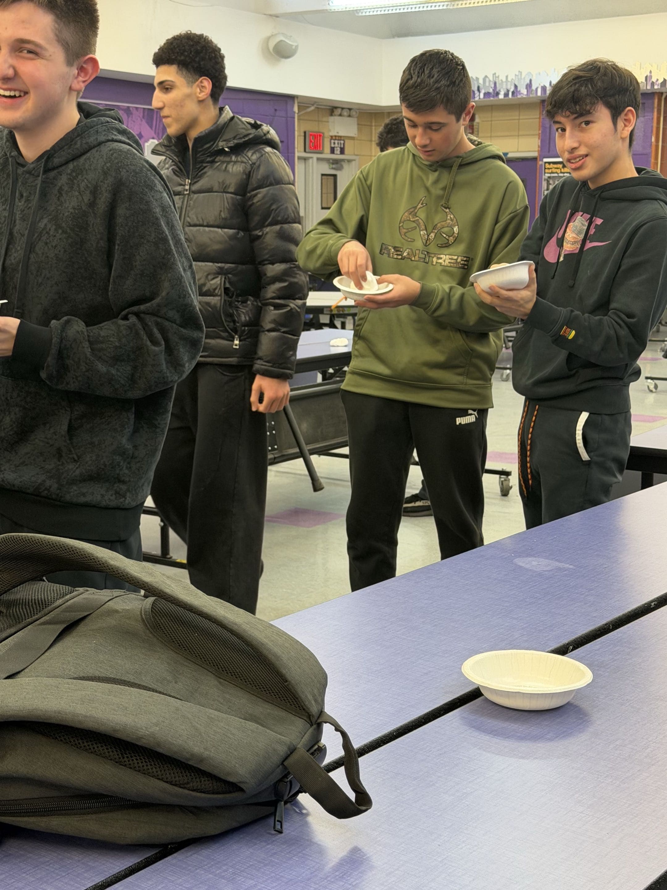 Student guiding a slime experiment